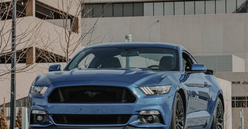 Mustang Car Reviews - Blue Ford Mustang on Road