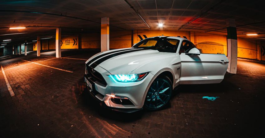 Mustang Customization - Parked White Coupe Inside Parking Lot