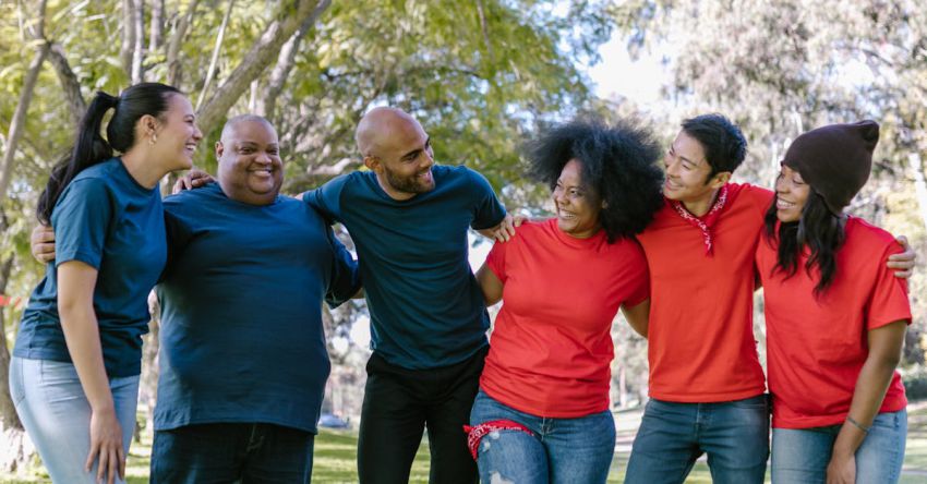 Mustang Events - Group of People Wearing Blue and Red Shirts